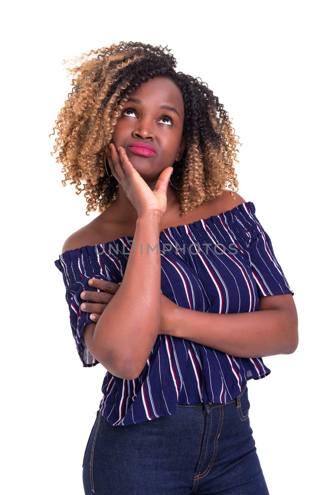 Studio shot: Young woman having a great idea