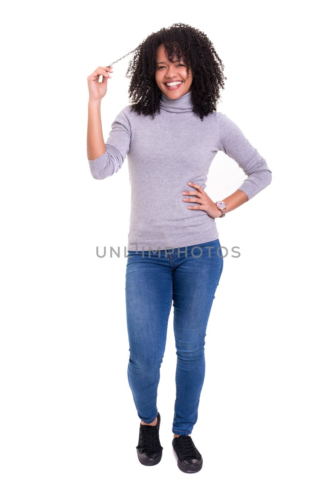 Beautiful young african woman posing isolated over white