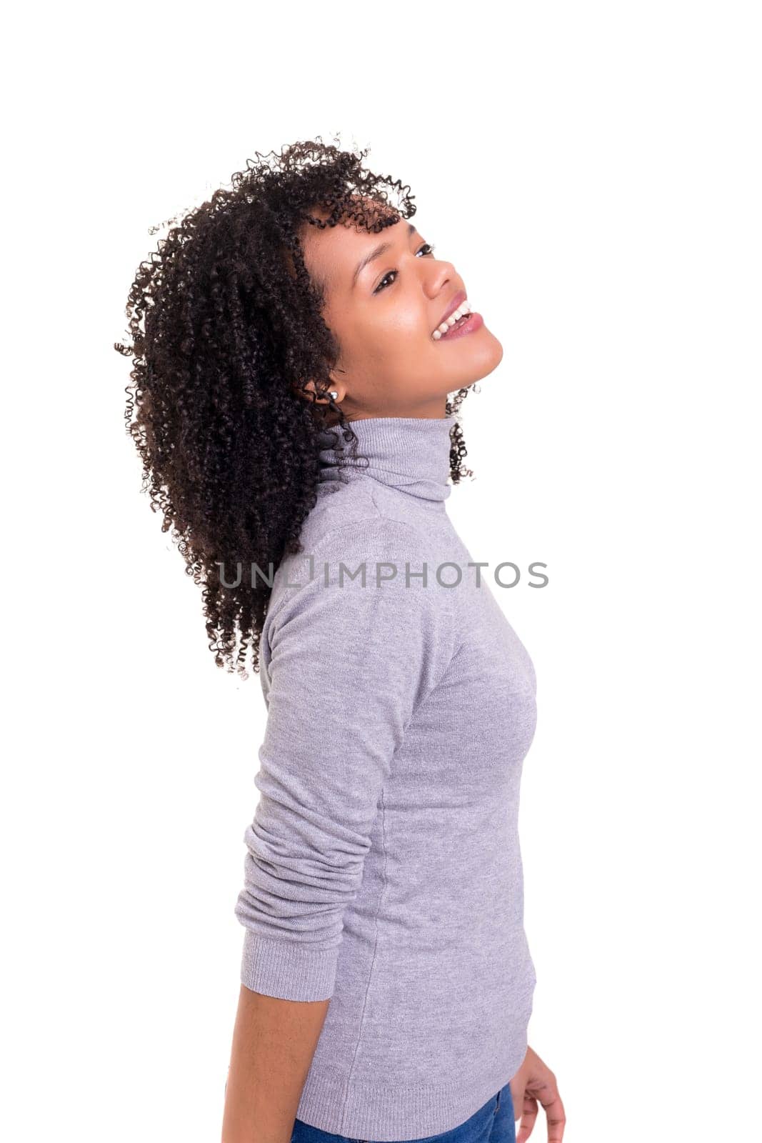 Beautiful young african woman posing isolated over white