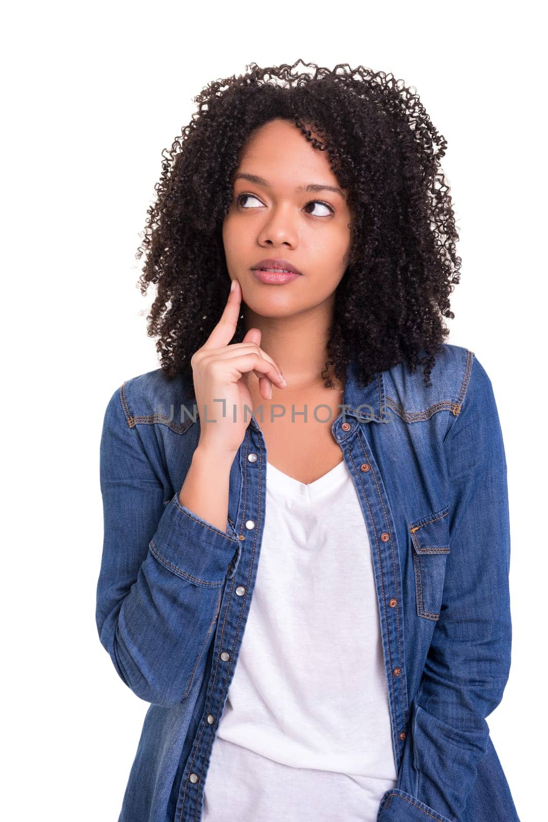 Studio shot: Young woman having a great idea