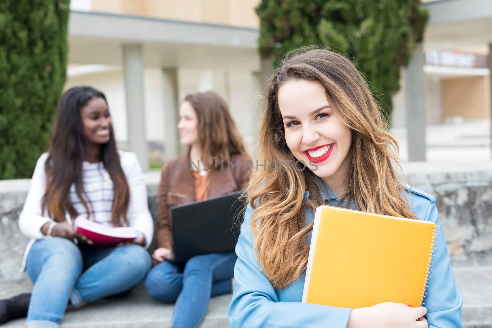 Group multi ethnic young students at the university campus