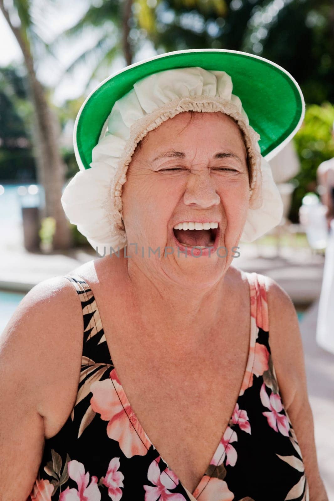 Woman laughing at the poolside, Biltmore Hotel, Coral Gables, Florida, USA