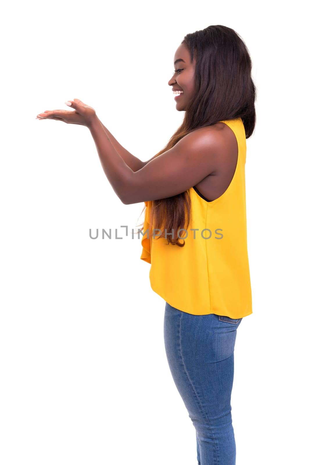 Beautiful african business woman presenting your product, isolated over white
