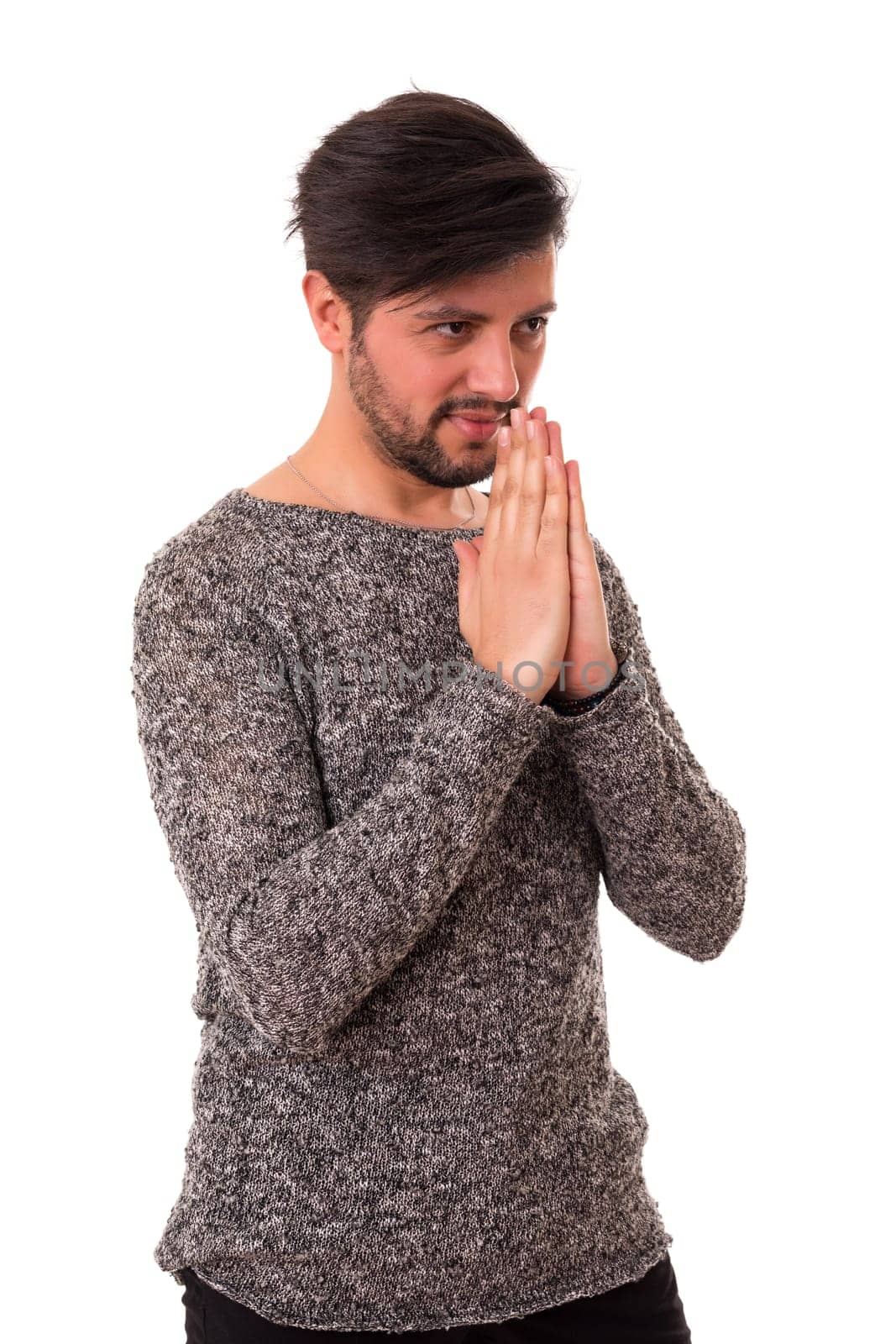 Studio picture of a young and handsome man posing isolated