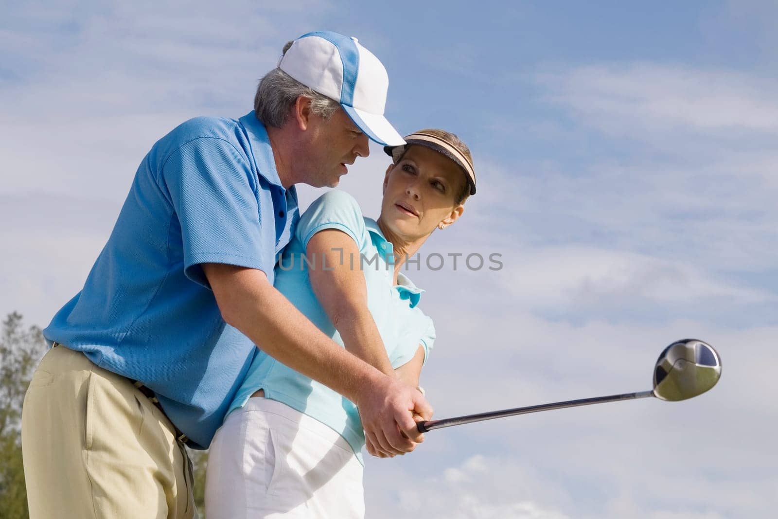 Golf instructor teaching golf to a woman, Biltmore Golf Course, Coral Gables, Florida, USA