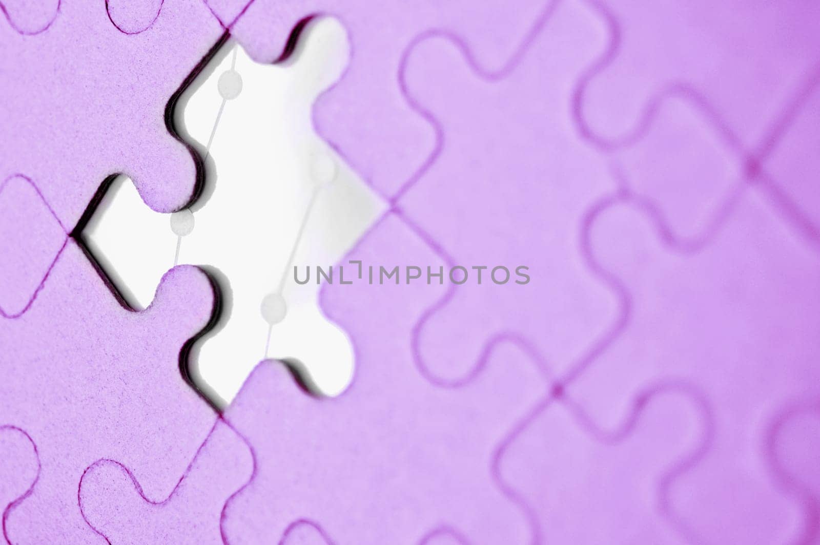 Completed jigsaw puzzle with a white piece