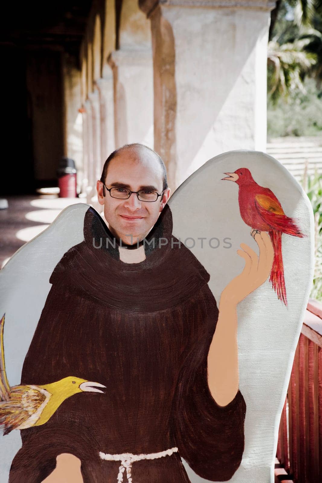 Man in the corridor of a church, Mission Santa Barbara, Santa Barbara, California, USA