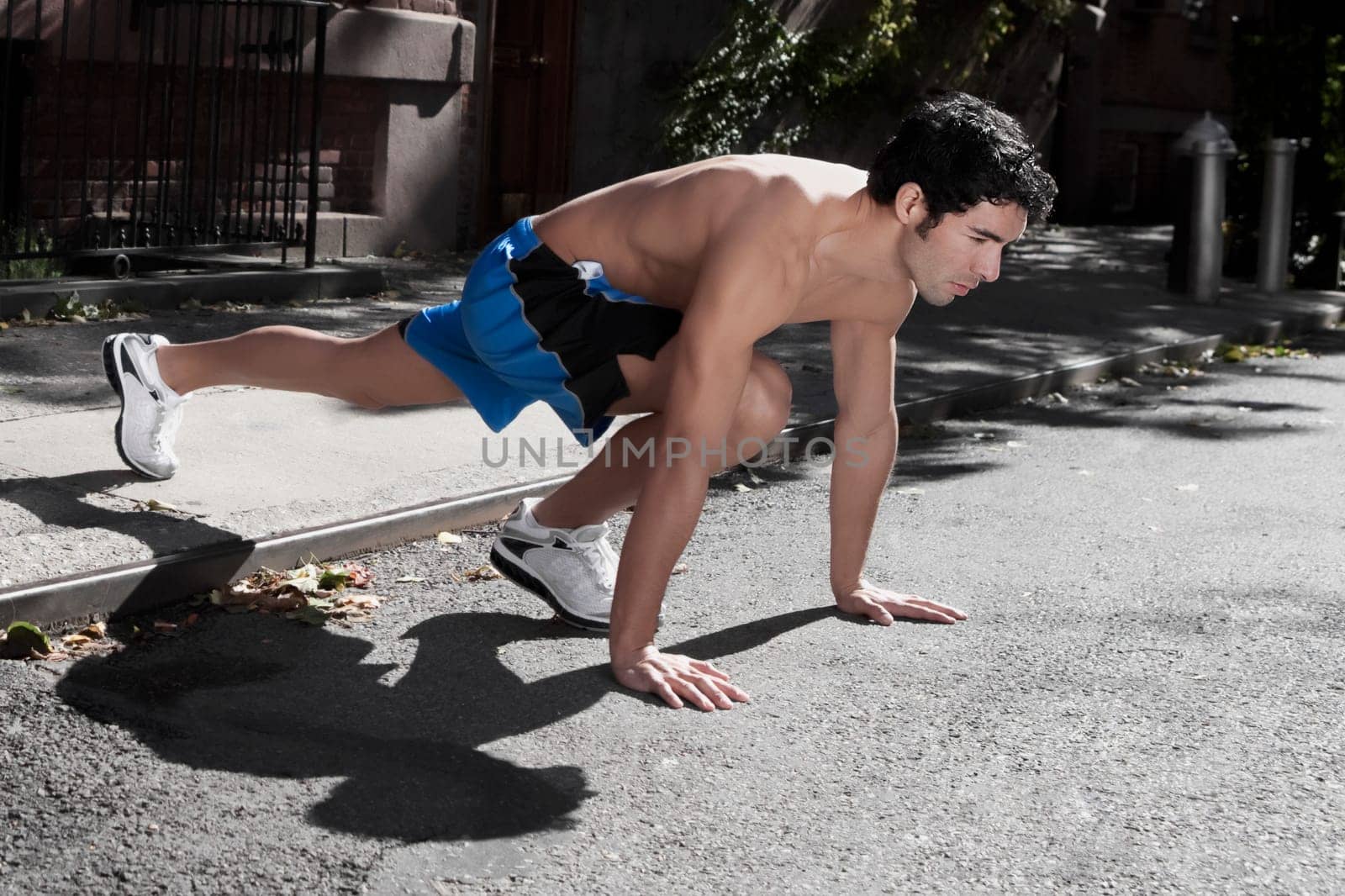 Man exercising in a street