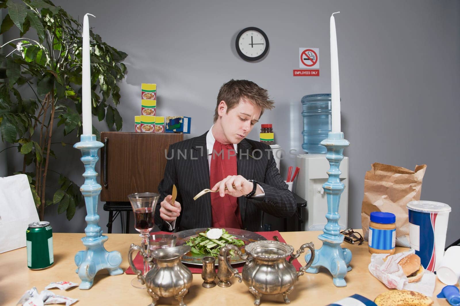 Businessman checking the time in lunch break