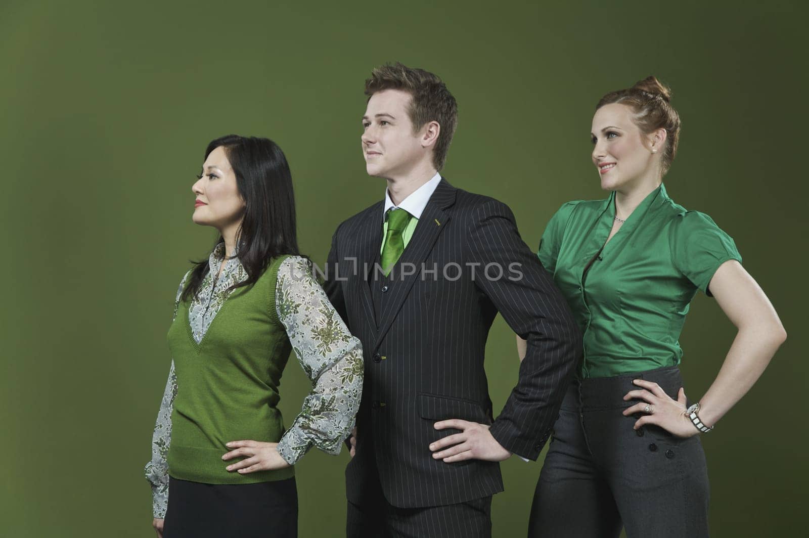 Three business executives standing in a row
