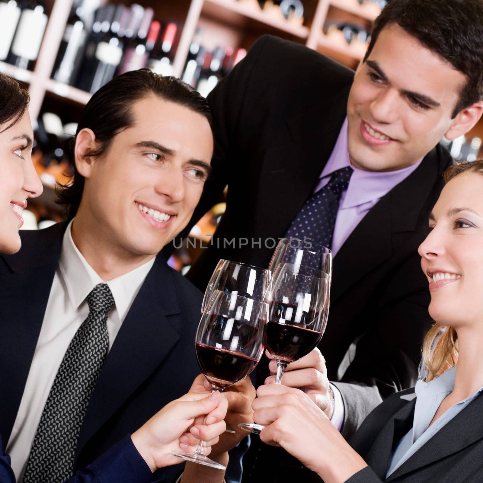 Business executives toasting with wine