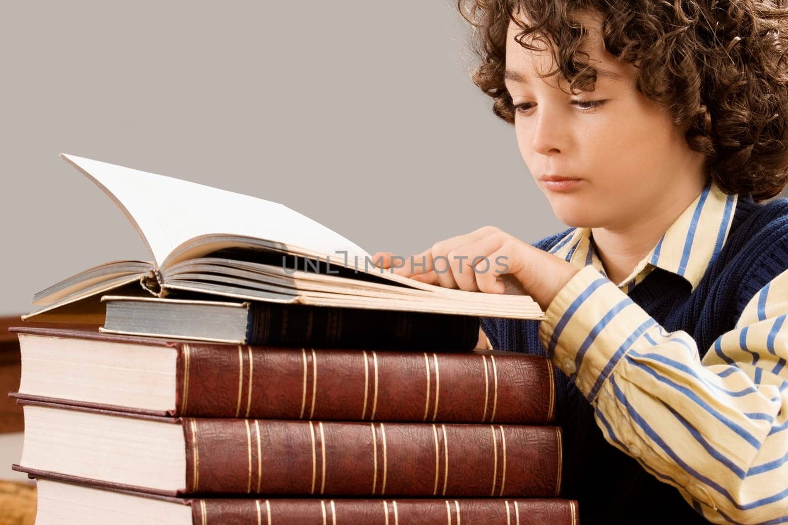 Schoolboy studying in a classroom