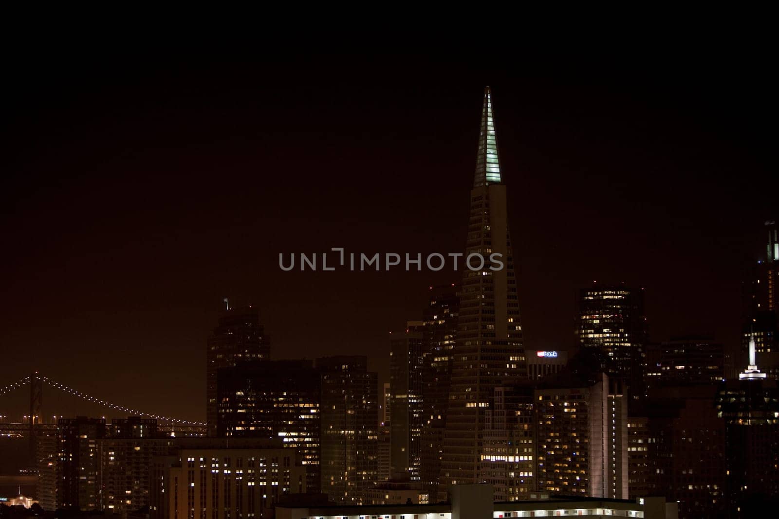 Buildings lit up at night, San Francisco, California, USA