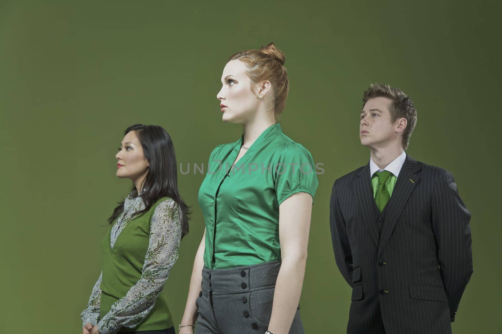 Three business executives standing together