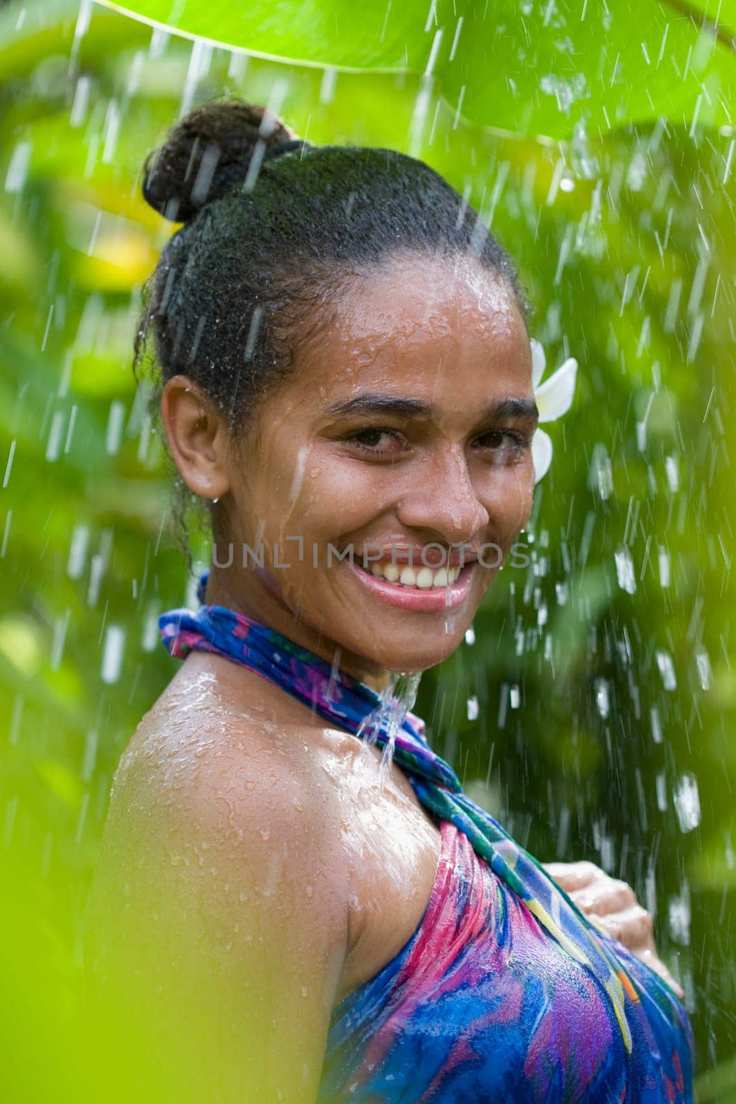 Portrait of a teenage girl enjoying shower
