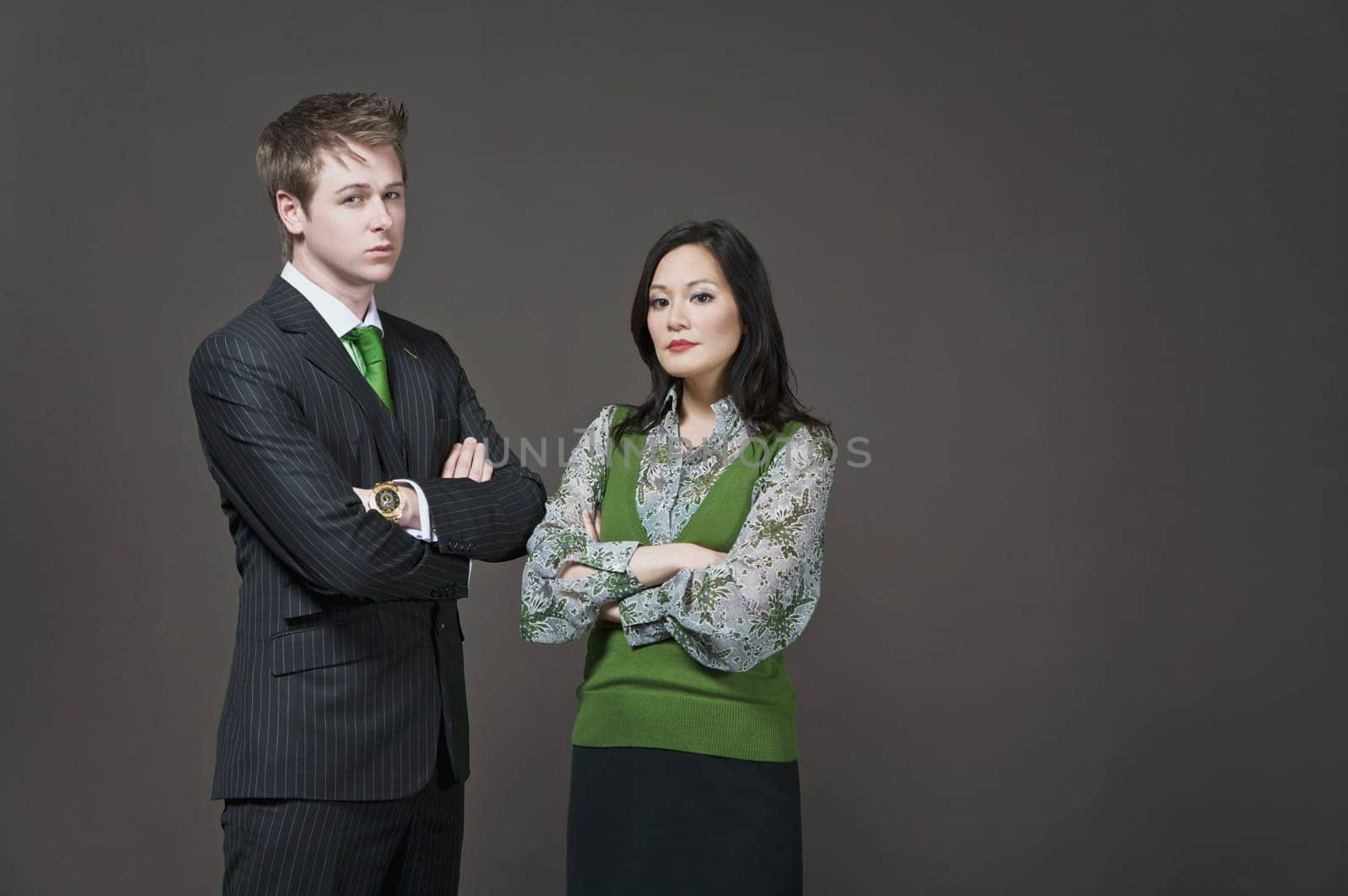 Portrait of a businessman and a businesswoman standing together