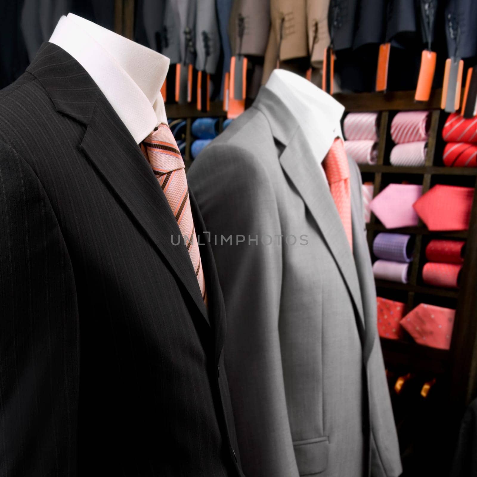 Mannequins dressed in formalwear in a clothing store