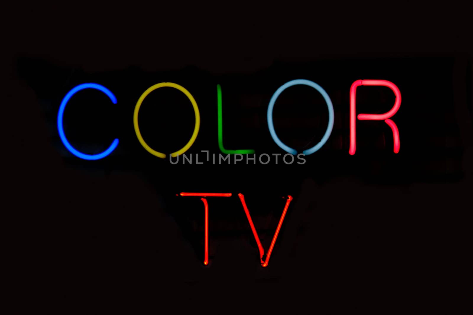 Close_up of a neon sign