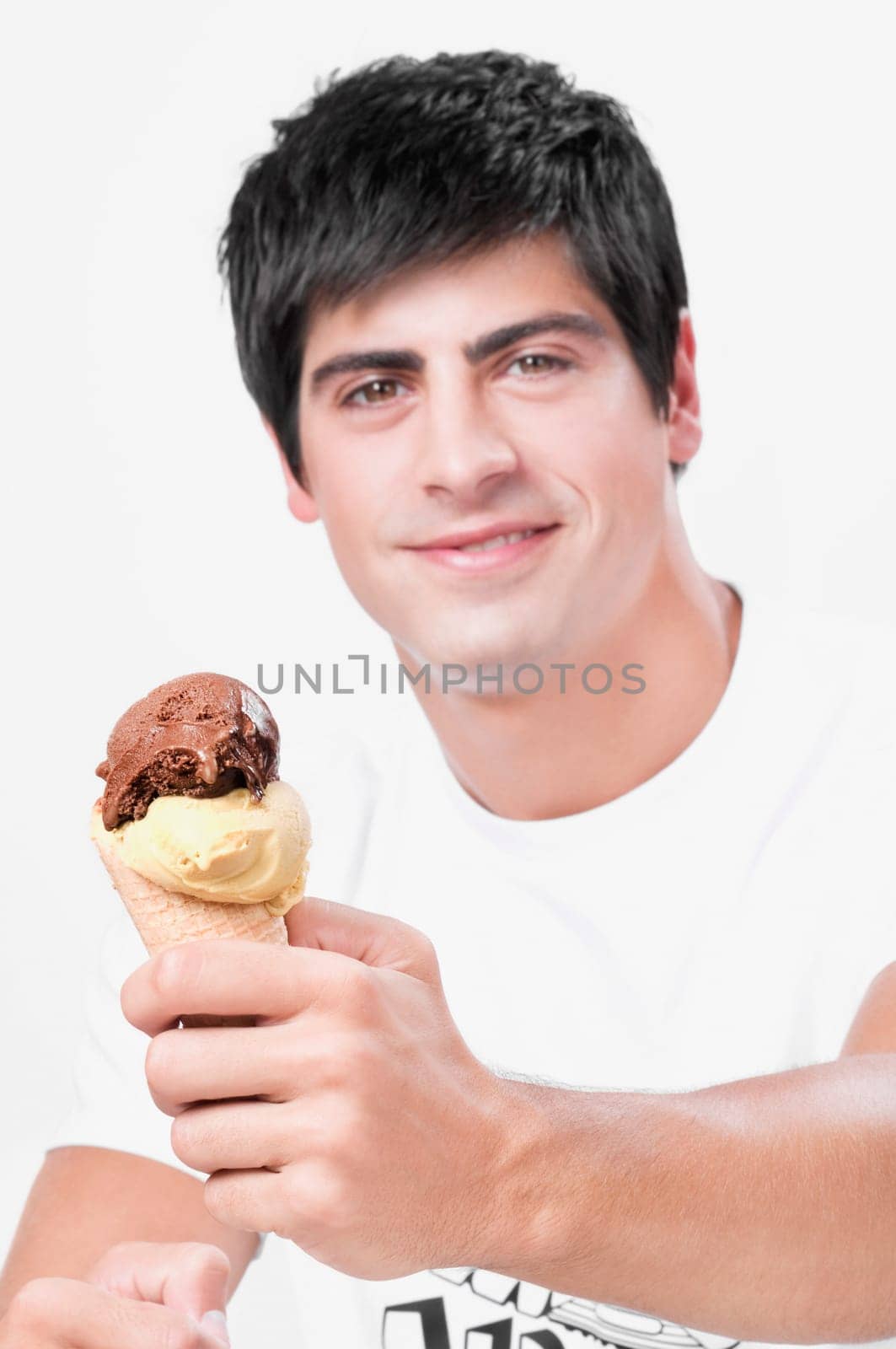 Close_up of a man holding an ice cream