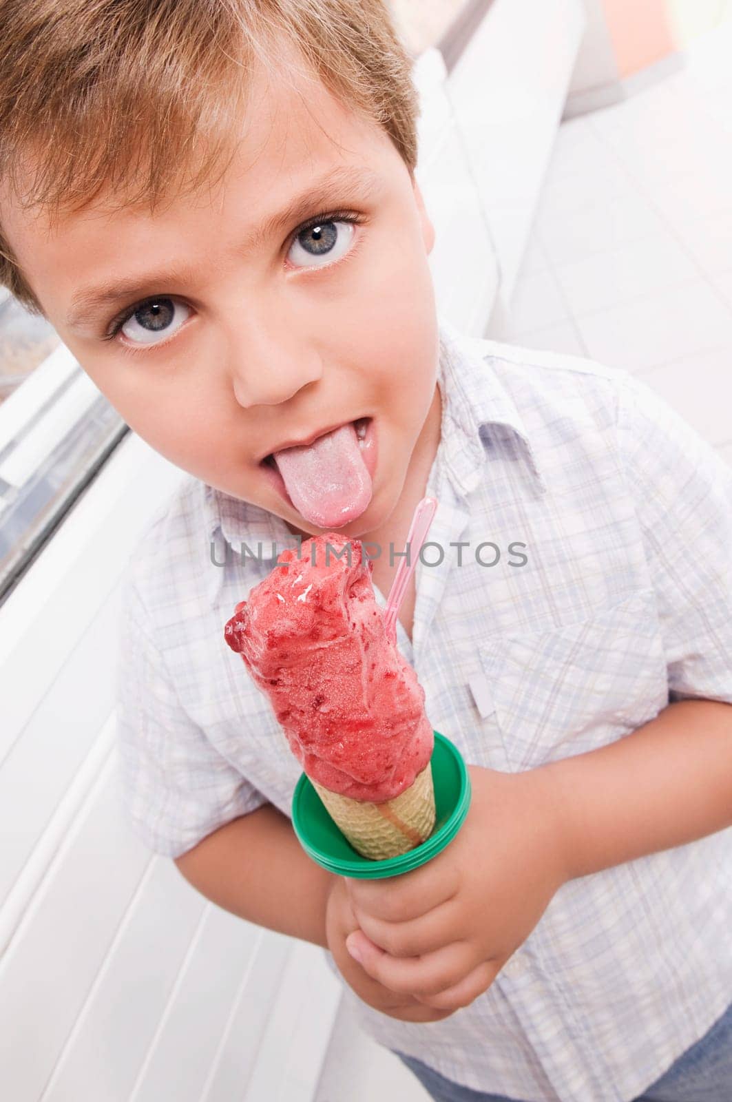 Boy licking an ice cream