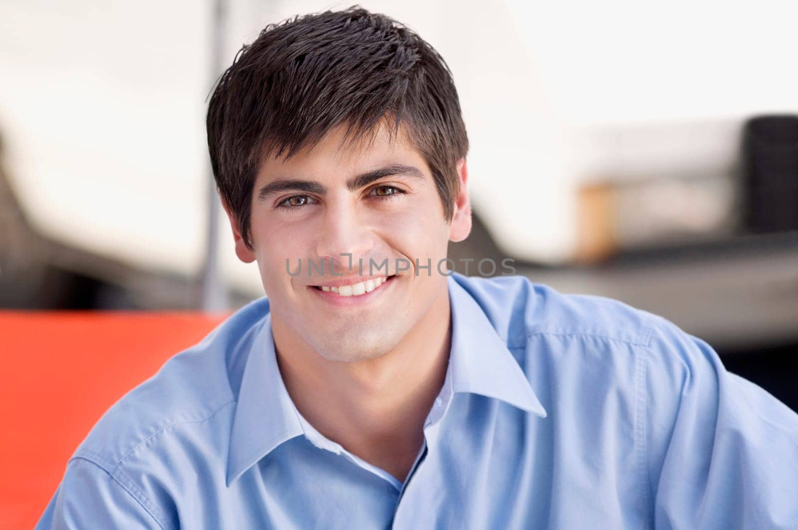 Man smiling in a restaurant