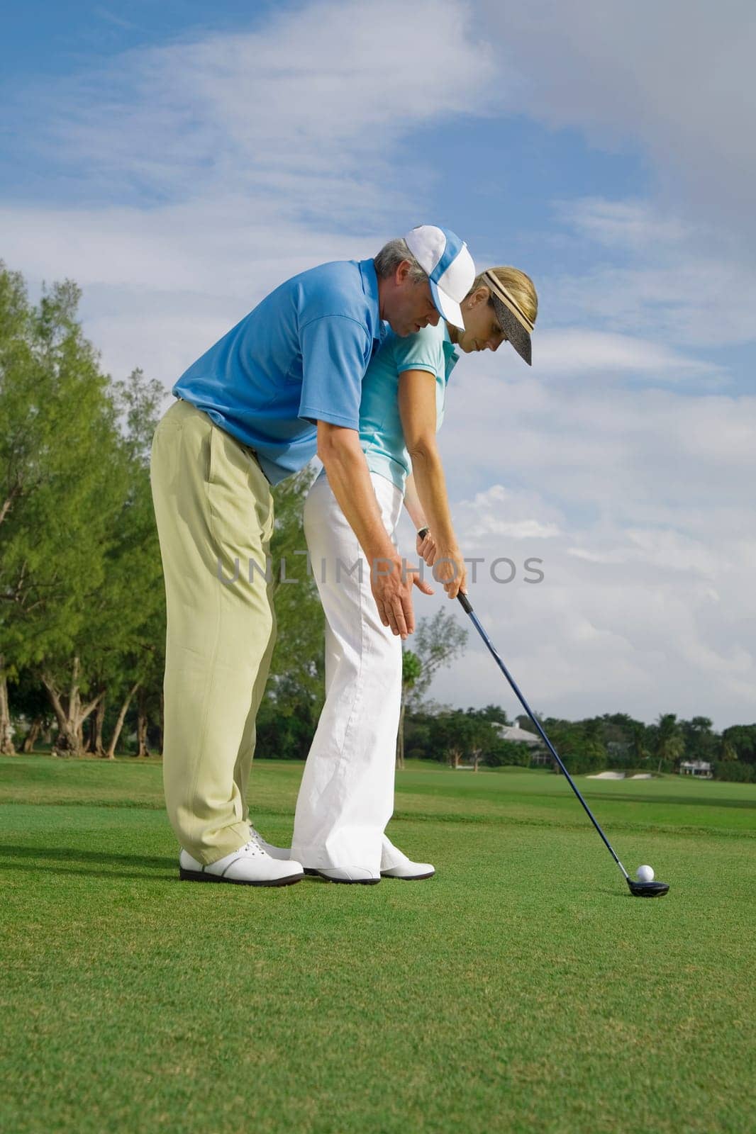 Golf instructor teaching golf to a woman, Biltmore Golf Course, Coral Gables, Florida, USA