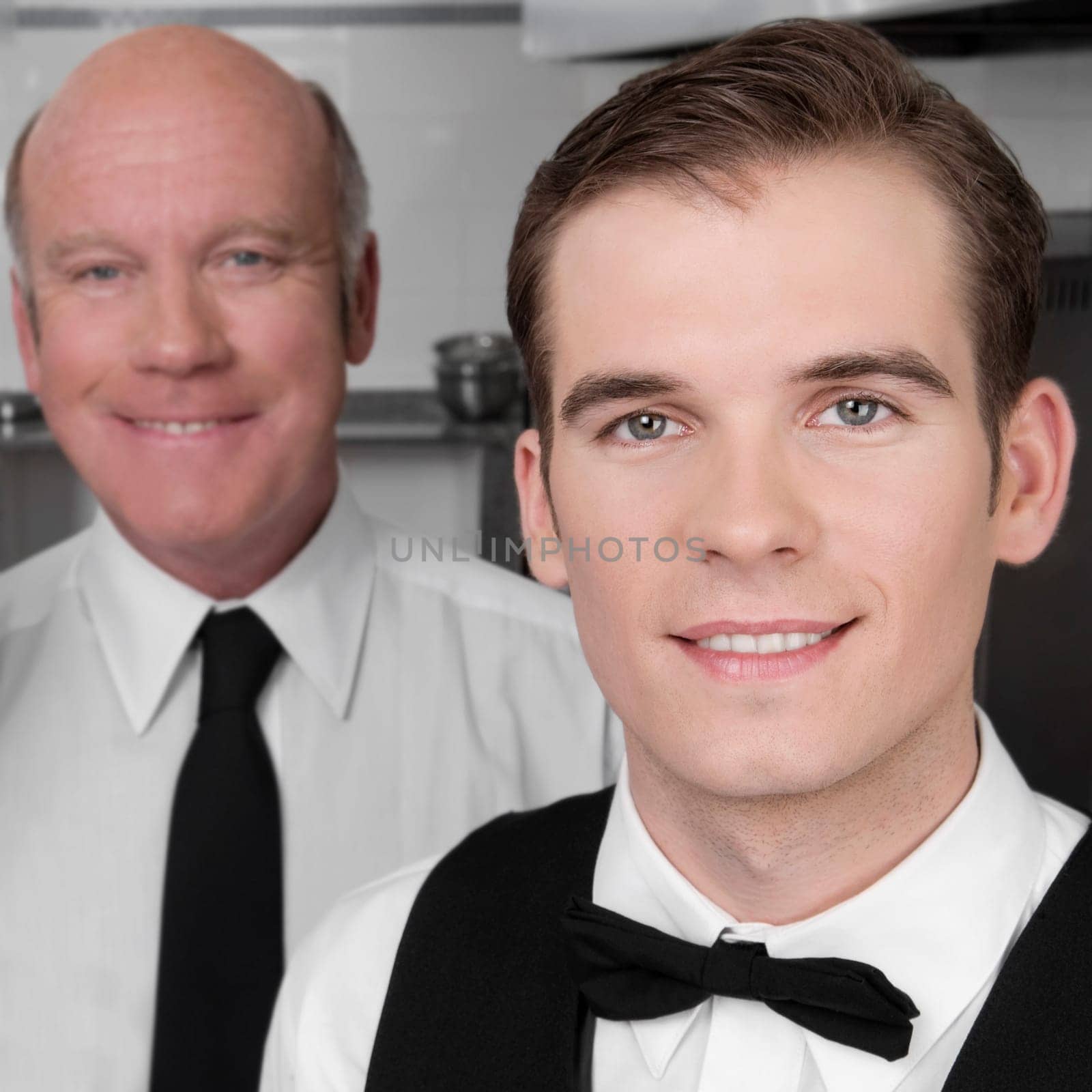 Waiters standing in the kitchen