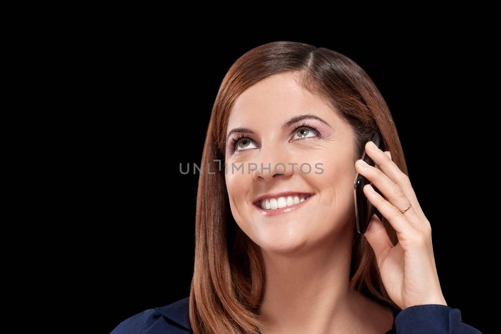 Woman talking on a mobile phone and smiling