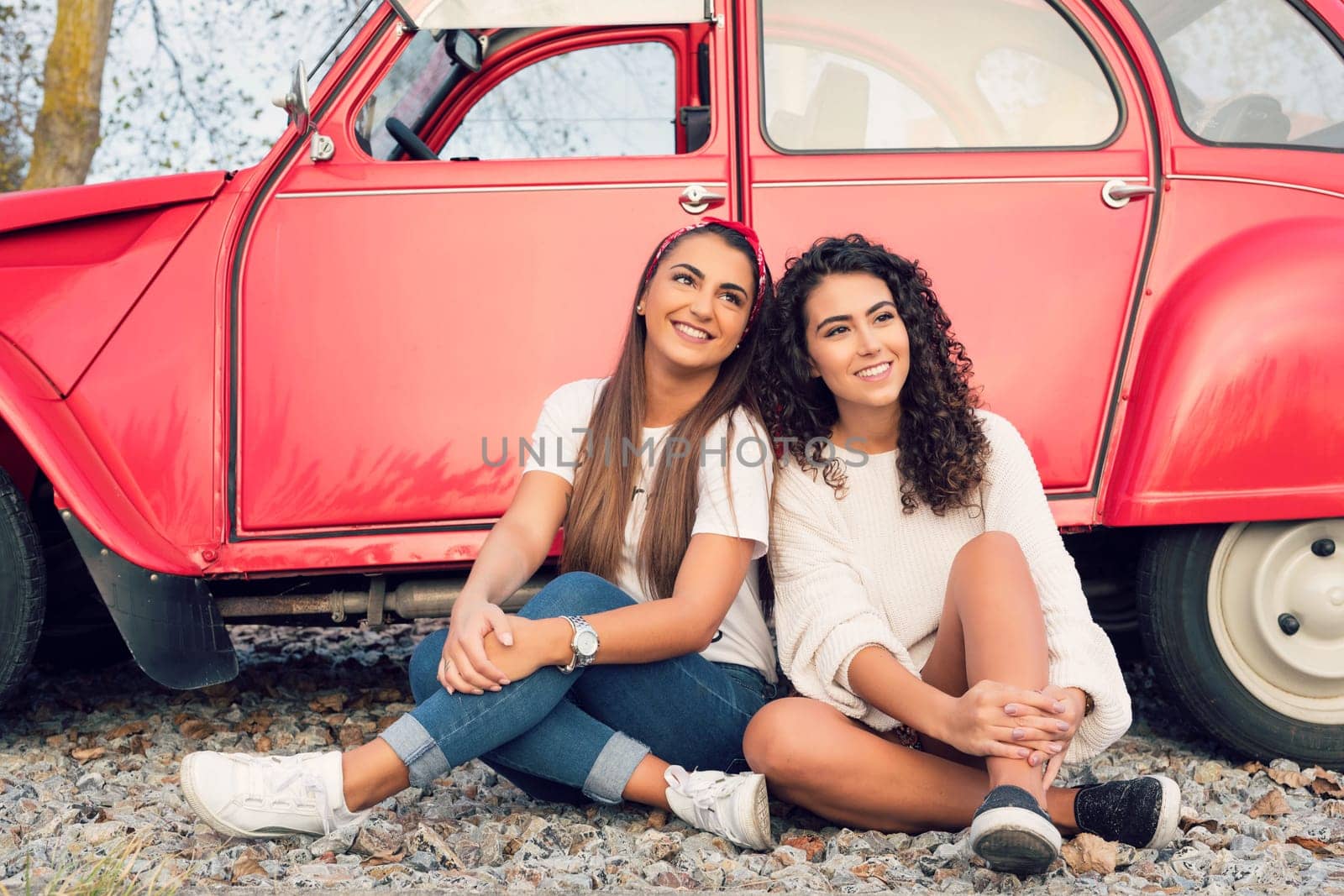 Two friends going on a roadtrip through countryside