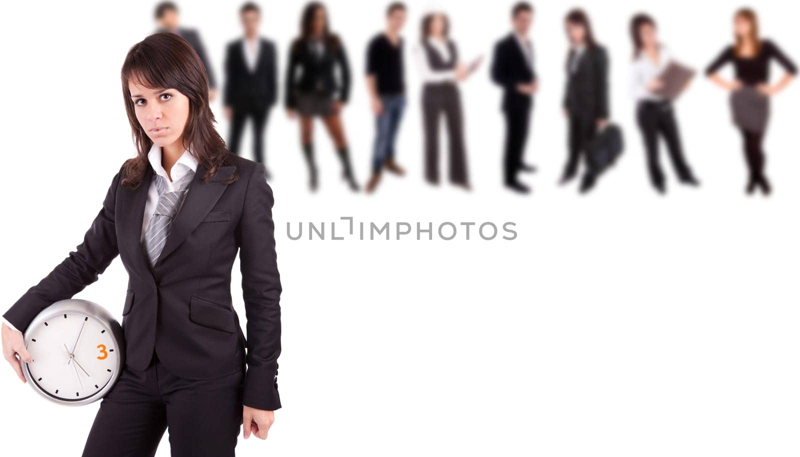 Business woman posing, with people in background