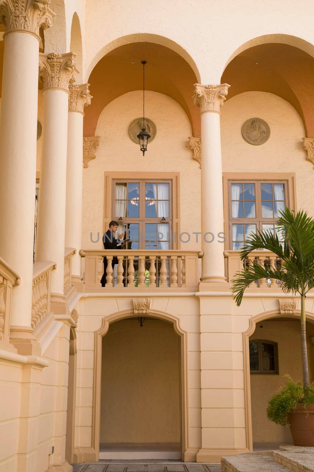 Businessman standing in the balcony, Biltmore Hotel, Coral Gables, Florida, USA