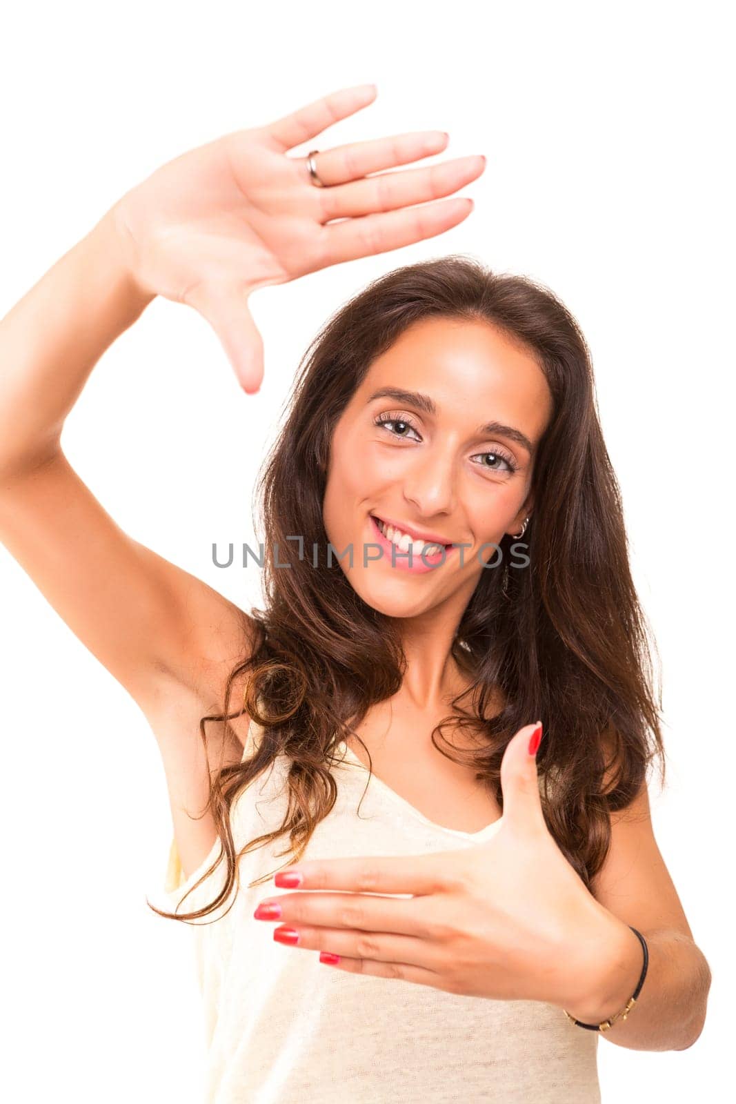 Young woman making framing key gesture - isolated over white