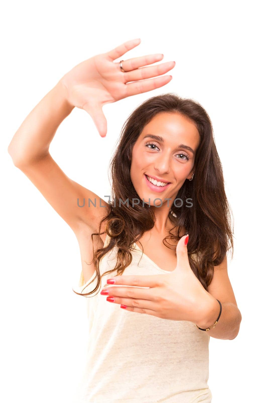 Young woman making framing key gesture - isolated over white