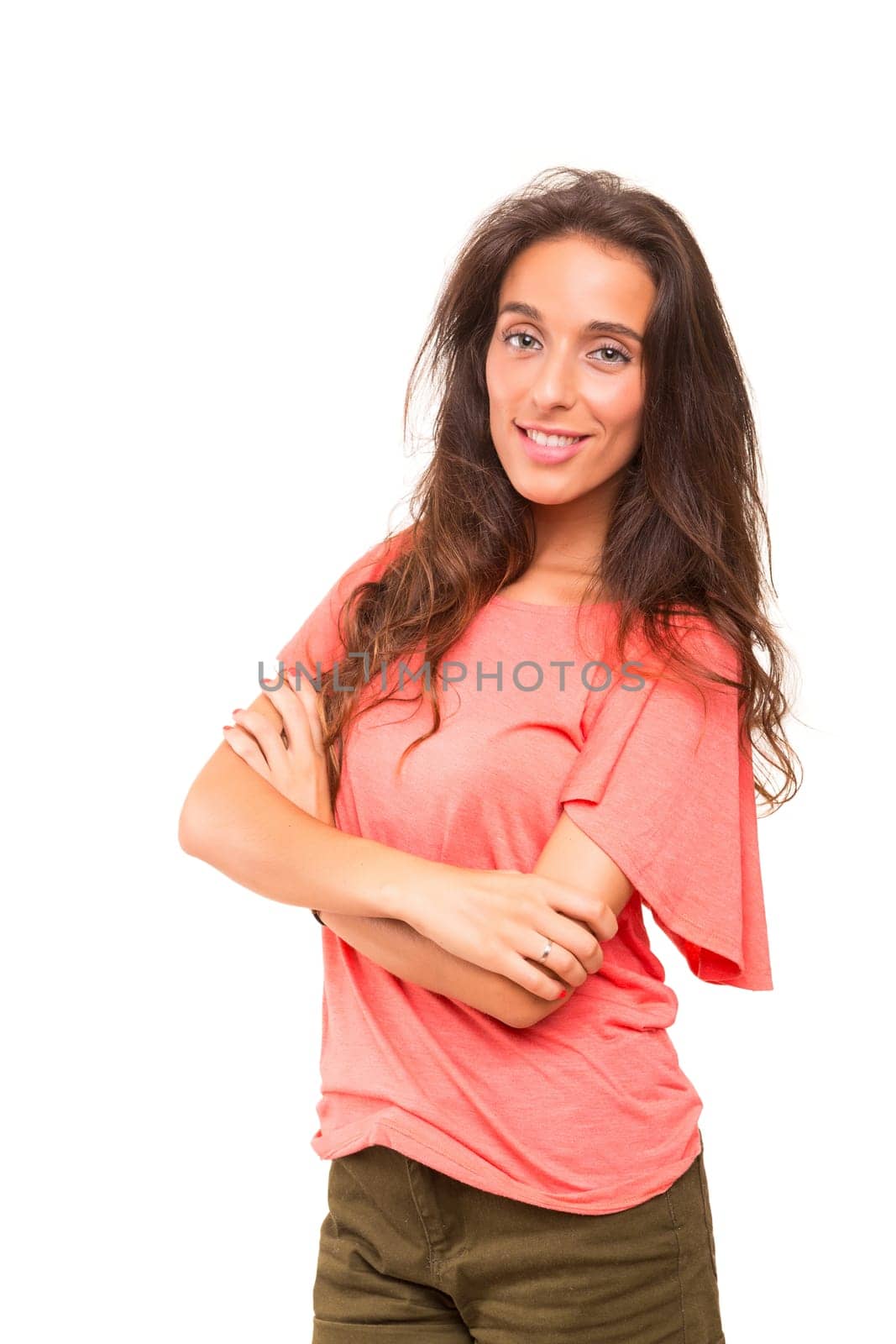 Beautiful young woman posing isolated over white background