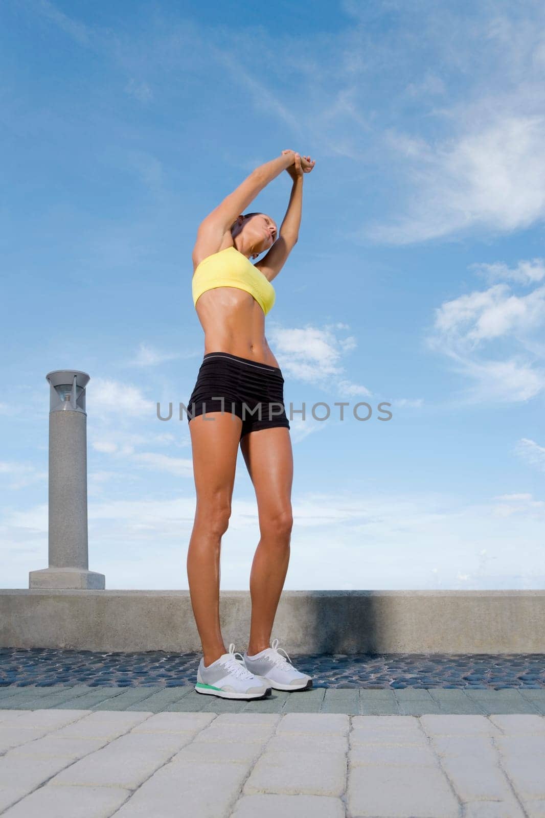 Mid adult woman exercising