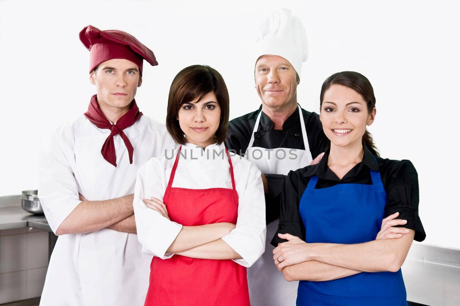Chefs standing in the kitchen