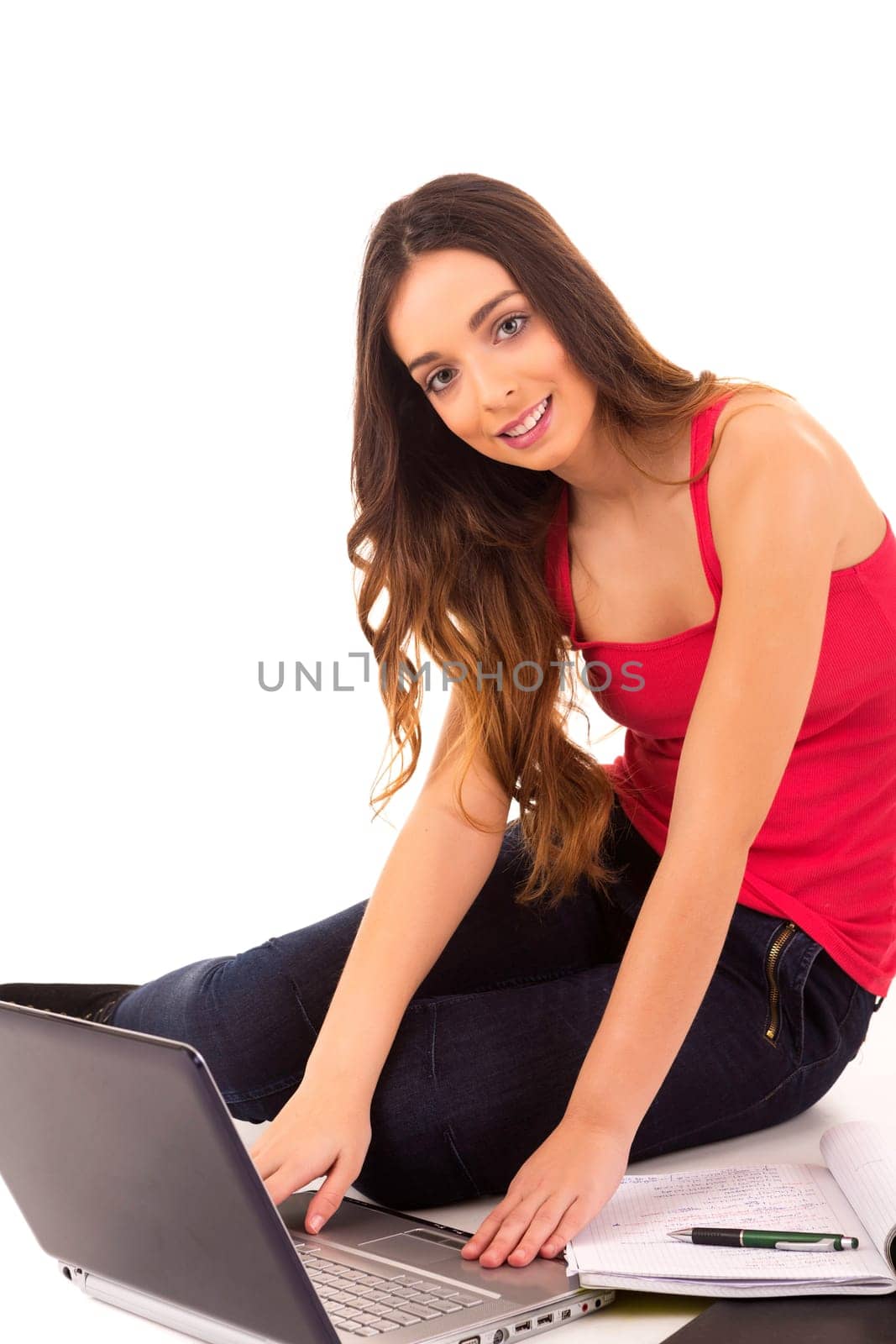 Young girl studying - isolated over white background