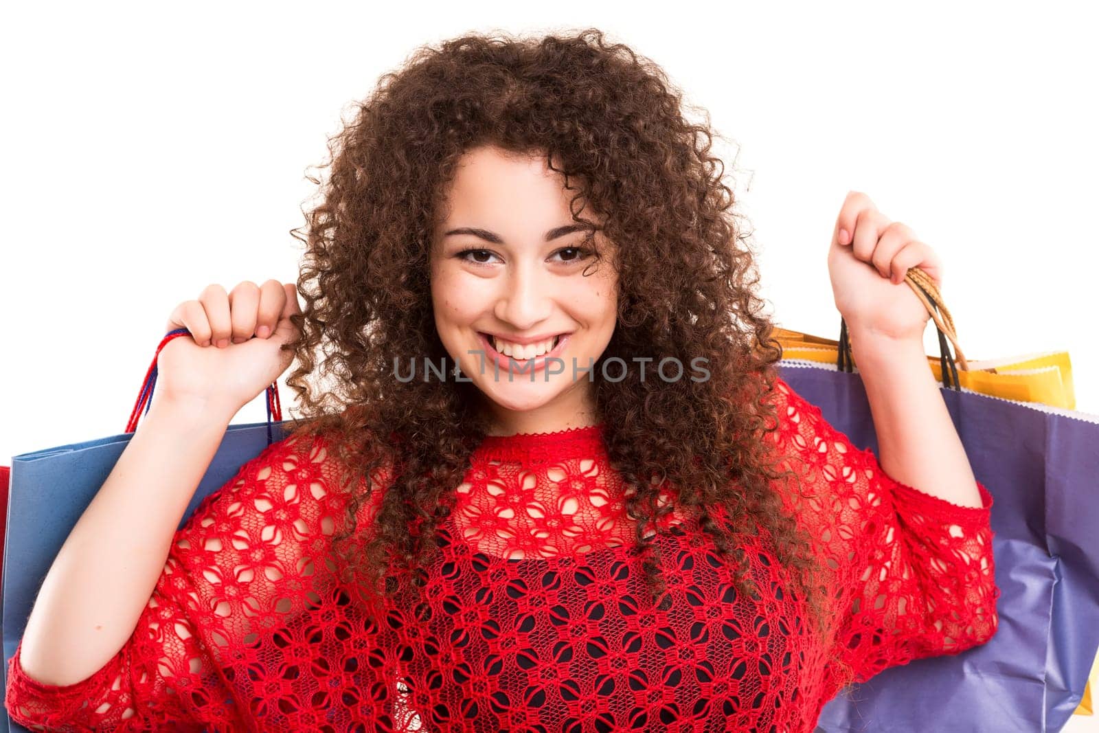 Happy beautiful woman with shopping bags