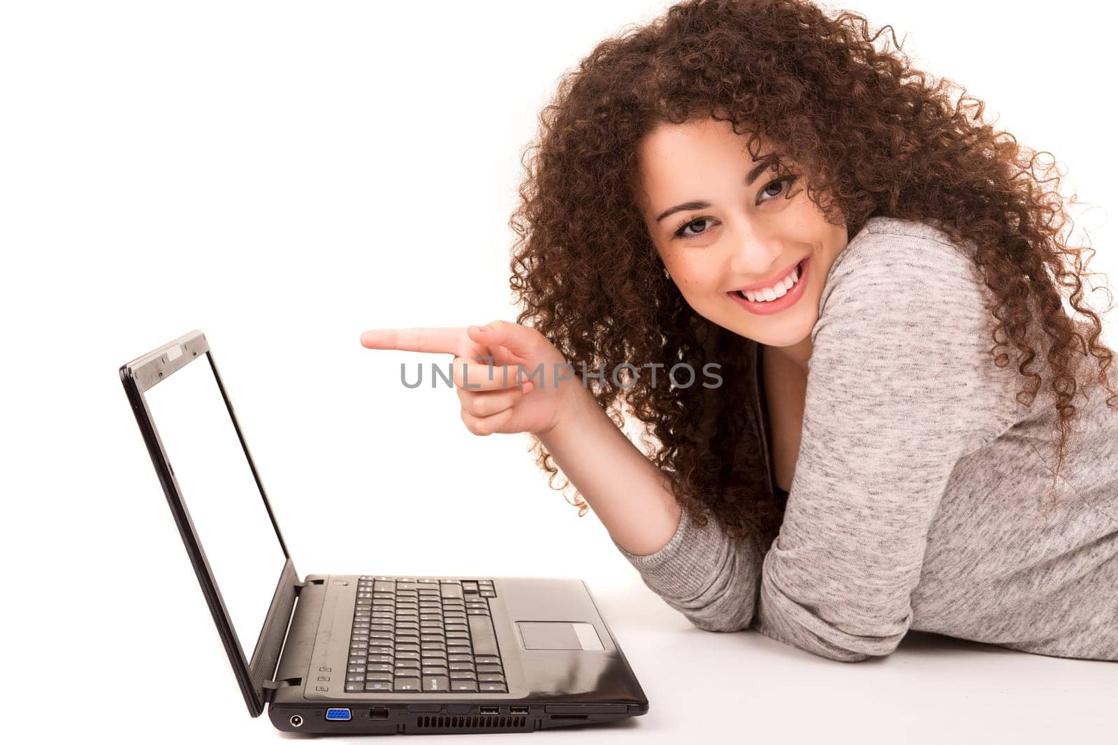 Young asian student working with her laptop, isolated over a white background