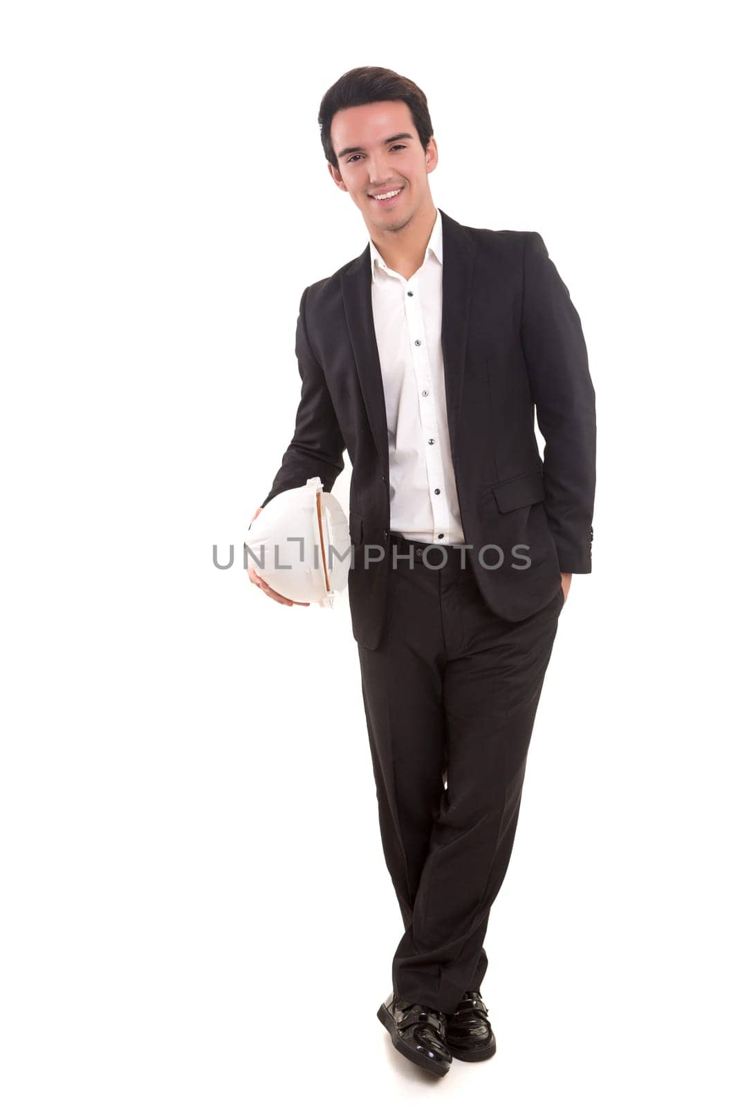 Handsome young engineer posing isolated over white background