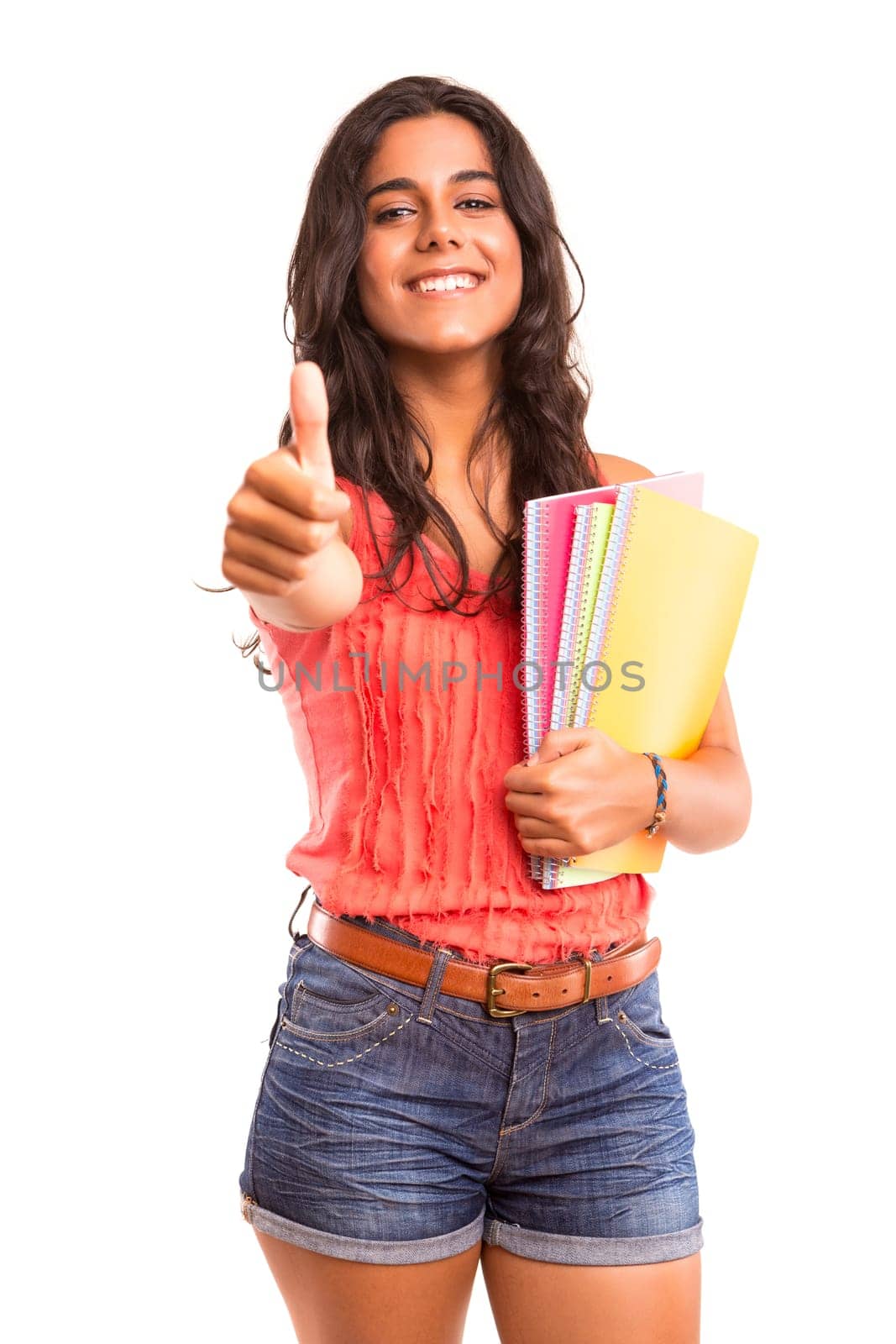 Young and beautiful student posing isolated over white