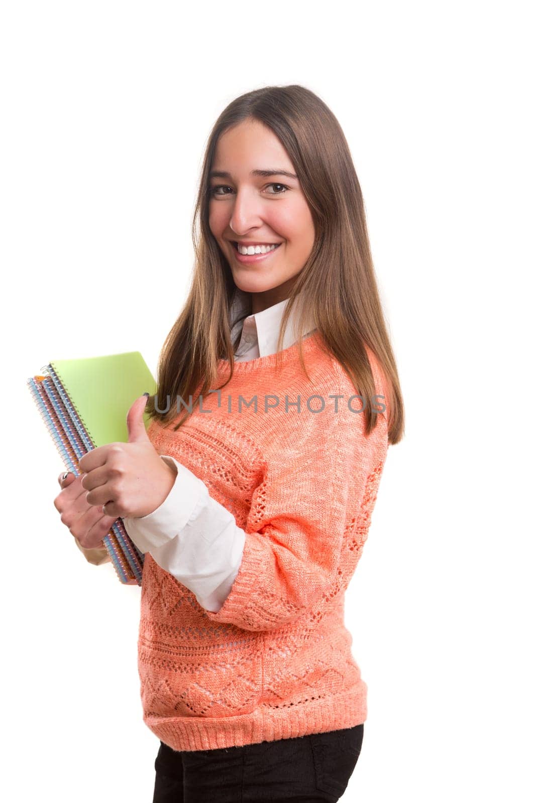 Young student posing over a white background