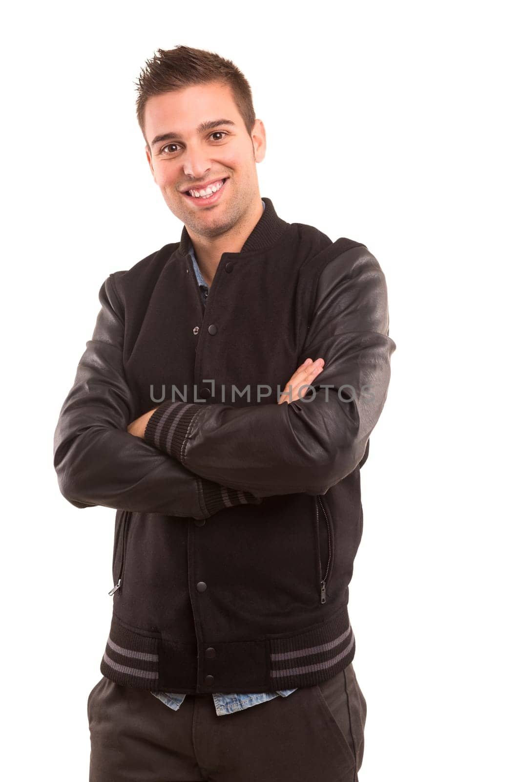 Studio picture of a young and handsome man posing isolated