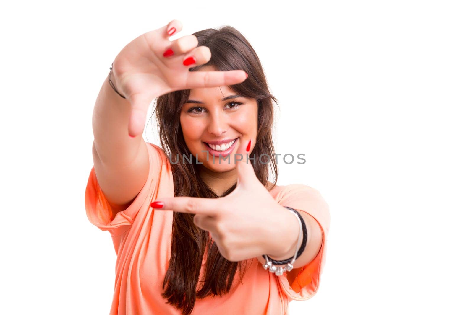 Young woman making framing key gesture - isolated over copy space background