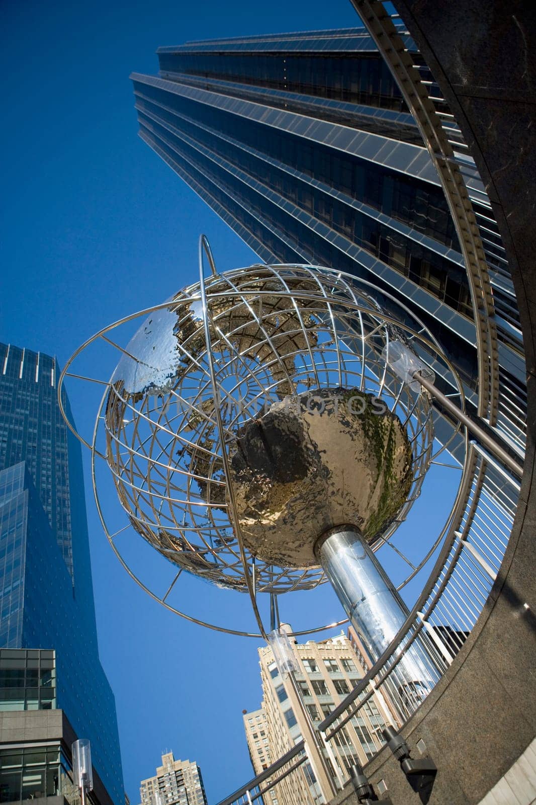 Low angle view of a globe sculpture in front of a building, Columbus Circle, Manhattan, New York City, New York State, USA