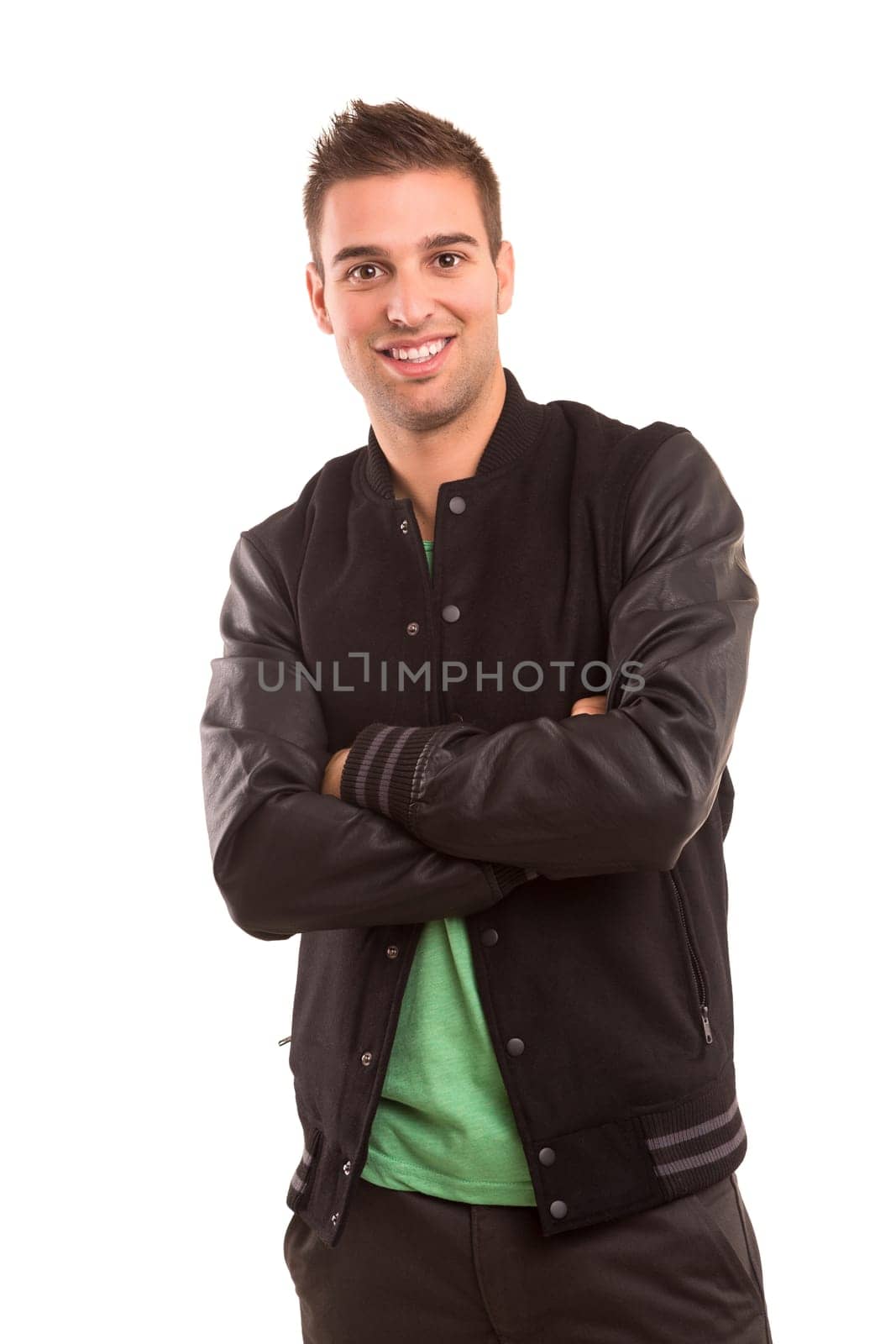 Studio picture of a young and handsome man posing isolated