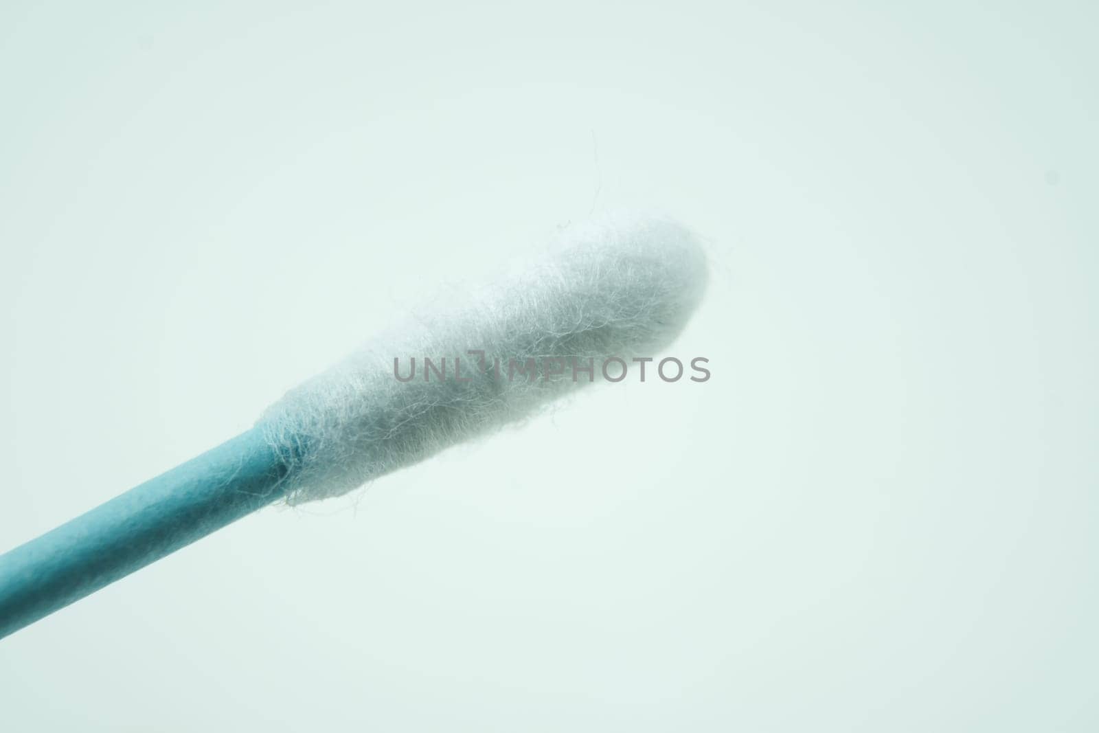 Surgical mask and cotton swab to fight against the coronavirus