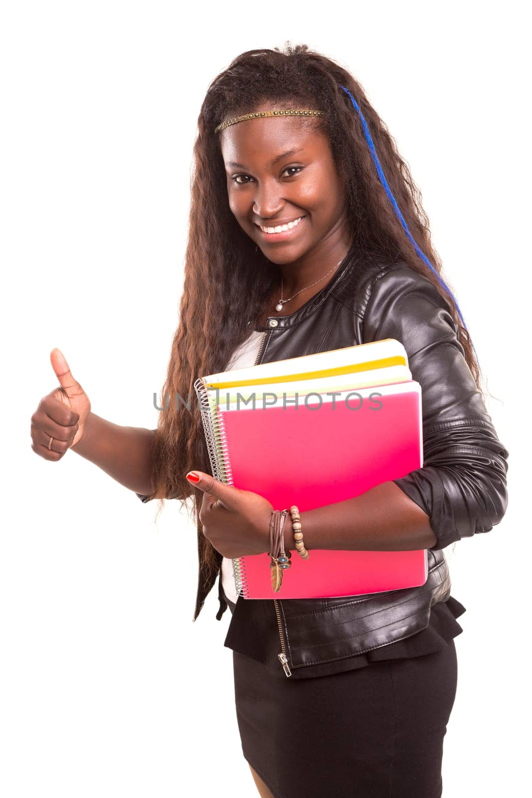 Beautiful african student woman posing isolated over white background
