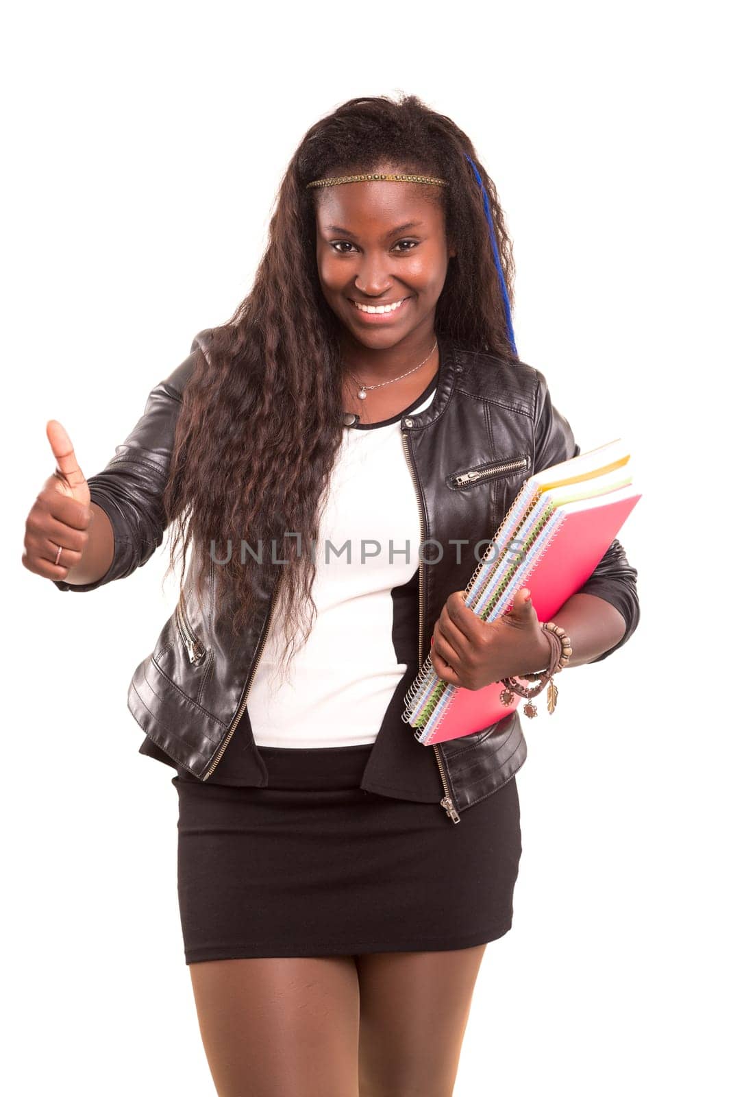 Beautiful african student woman posing isolated over white background