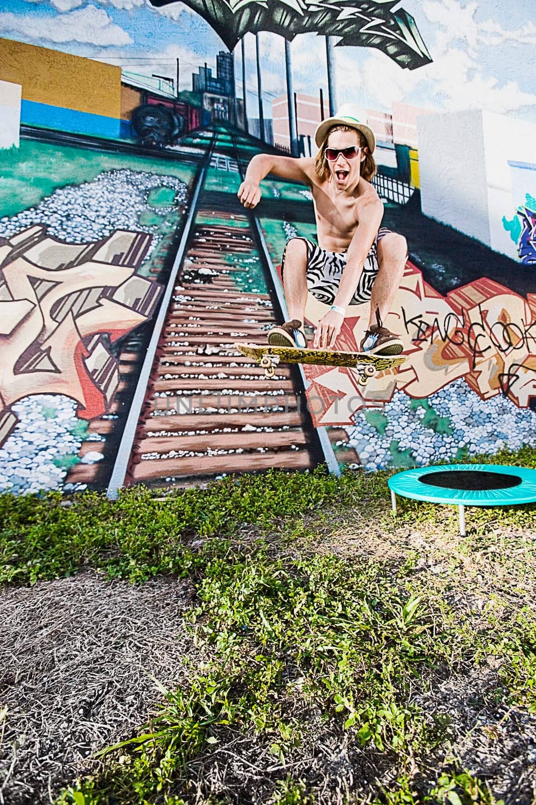 Low angle view of a young man skateboarding
